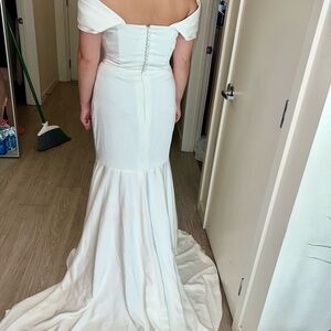 Brand New trumpet style dress. Size S/M 6/7 color is more of an off-white